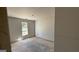 Bare bedroom with a single window waiting to be personalized with decor at 4139 Alayna Lee Cir, Mcdonough, GA 30252