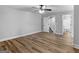 This bedroom boasts hardwood floors, natural light, and easy access to bathroom and stairs at 4139 Alayna Lee Cir, Mcdonough, GA 30252