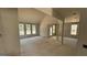 Spacious living area featuring large windows and architectural support columns at 4139 Alayna Lee Cir, Mcdonough, GA 30252