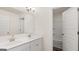 Double sink bathroom with a view of the tub in the background at 1712 Goodwin Dr, Hampton, GA 30228