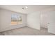 Clean, modern bedroom with a walk-in closet and window view at 1712 Goodwin Dr, Hampton, GA 30228