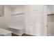 Mudroom features a built-in bench, storage cabinets, and a convenient side entrance at 1712 Goodwin Dr, Hampton, GA 30228