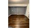 Finished basement featuring modern floors, neutral walls and updated paint at 452 Fedora Nw Way, Atlanta, GA 30331