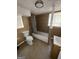 Full bathroom featuring tiled floor, tub with shower, toilet and sink at 452 Fedora Nw Way, Atlanta, GA 30331