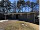 Charming brick home featuring a well-maintained front yard and a welcoming entrance at 452 Fedora Nw Way, Atlanta, GA 30331