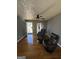 Cozy living room with hardwood floors, ceiling fan, and comfortable seating at 452 Fedora Nw Way, Atlanta, GA 30331