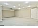 Finished basement features neutral walls, a fan, recessed lights, and plush carpeting at 165 Standing Oak Pl, Fayetteville, GA 30214