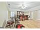Finished basement featuring a bar with stools, recessed lighting, and wood-look flooring at 165 Standing Oak Pl, Fayetteville, GA 30214