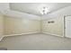 Finished basement space with carpeting, recessed lights, and neutral paint at 165 Standing Oak Pl, Fayetteville, GA 30214