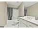 Full bathroom with a tub-shower combination, toilet, and vanity with storage at 165 Standing Oak Pl, Fayetteville, GA 30214
