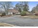 Charming community center with manicured landscaping and welcoming entrance at 165 Standing Oak Pl, Fayetteville, GA 30214