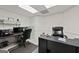 Office features two work stations and chairs at 7395 Old Rico Rd., Chattahoochee Hills, GA 30268