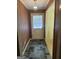 Charming entryway with stone tile and a decorative hanging light fixture at 2518 Caladium Ne Dr, Atlanta, GA 30345