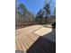 Wooden deck surrounded by trees at 1105 Bradford Park Dr, Auburn, GA 30011