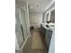 Modern bathroom featuring a glass-enclosed shower and double sink vanity at 11523 Kimberly Way # 6, Hampton, GA 30228