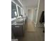 Bright bathroom with granite counters, stylish sinks, and a glass-enclosed shower at 11523 Kimberly Way # 6, Hampton, GA 30228