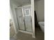 Stylish bathroom featuring a glass-enclosed shower, tiled walls, and modern fixtures at 11523 Kimberly Way # 6, Hampton, GA 30228