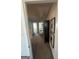 Hallway offering views of bedrooms, featuring soft carpeting and neutral walls at 11523 Kimberly Way # 6, Hampton, GA 30228