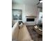 Cozy living room featuring a contemporary fireplace, plush seating, and stylish accents for a relaxed atmosphere at 11523 Kimberly Way # 6, Hampton, GA 30228