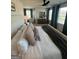 Spacious main bedroom with neutral tones, large windows, and comfortable furniture at 11523 Kimberly Way # 6, Hampton, GA 30228