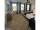 Well-lit main bedroom featuring neutral tones, large windows, and stylish decor at 11523 Kimberly Way # 6, Hampton, GA 30228