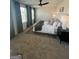 Spacious bedroom with ceiling fan, large windows, and plush carpeting at 11551 Kimberly Way # 17, Hampton, GA 30228