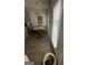 Bright dining area with hardwood floors, modern lighting, and a cozy breakfast nook at 11551 Kimberly Way # 17, Hampton, GA 30228