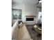 Living room with comfortable seating, fireplace, and large area rug at 11551 Kimberly Way # 17, Hampton, GA 30228