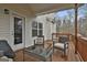 Outdoor deck with cozy seating, perfect for entertaining or relaxing at 130 Brooks Cir, Hampton, GA 30228
