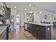 Bright and airy kitchen with a spacious island, modern appliances, and ample cabinet space at 130 Brooks Cir, Hampton, GA 30228