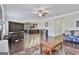 Spacious living room boasts hardwood floors and comfortable seating, creating a cozy and inviting atmosphere at 130 Brooks Cir, Hampton, GA 30228