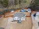 Aerial view of home, in-ground pool, wooden fence, detached garage, and expansive yard at 31 Pecan Lake Ct, Sharpsburg, GA 30277