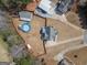 Aerial view of property featuring a home, pool, and large yard at 31 Pecan Lake Ct, Sharpsburg, GA 30277