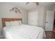 Bedroom with a bed and closet at 31 Pecan Lake Ct, Sharpsburg, GA 30277
