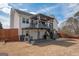 Two-story home featuring a spacious, two-level deck, and a well-maintained yard at 31 Pecan Lake Ct, Sharpsburg, GA 30277