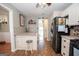 Bright kitchen featuring modern appliances, white cabinets, and stylish countertops at 31 Pecan Lake Ct, Sharpsburg, GA 30277