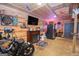 Cozy living area featuring an electric fireplace, TV, and comfortable seating at 31 Pecan Lake Ct, Sharpsburg, GA 30277