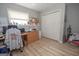 Bright office space featuring a large closet, wood flooring and a window with natural light at 31 Pecan Lake Ct, Sharpsburg, GA 30277