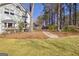 Spacious backyard with mature trees offers serene privacy at 339 Kensington Dr, Peachtree City, GA 30269