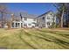 The backyard features a sunroom and stone patio at 339 Kensington Dr, Peachtree City, GA 30269