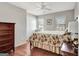 Bedroom with wood floors, double windows, and closet at 339 Kensington Dr, Peachtree City, GA 30269