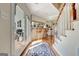 Foyer with stairs and view of outdoor patio and kitchen bar area at 339 Kensington Dr, Peachtree City, GA 30269