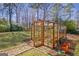 Greenhouse with transparent walls for nurturing plant growth at 339 Kensington Dr, Peachtree City, GA 30269