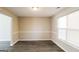 Empty dining room area with a window and hard surface floors at 5345 Bridle Point Pkwy, Snellville, GA 30039