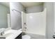 Bathroom featuring a shower and tub combination, neutral walls, and vanity with sink at 7569 Bowhead Ct, Fairburn, GA 30213