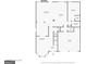 Detailed first floor plan showing layout of living room, kitchen, dining room, and garage at 7569 Bowhead Ct, Fairburn, GA 30213