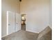Bedroom featuring closet space and an open doorway into the kitchen at 6290 Shallowford Way, Douglasville, GA 30135