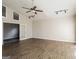 Spacious living room with vaulted ceilings, wood-look flooring, modern lighting, and ample natural light at 6290 Shallowford Way, Douglasville, GA 30135