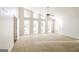 Bright living room with vaulted ceiling and an abundance of natural light at 6290 Shallowford Way, Douglasville, GA 30135