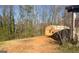 View of backyard of a home showing a wooden storage shed with room for outdoor activities at 4547 Duncan Dr, Sugar Hill, GA 30518